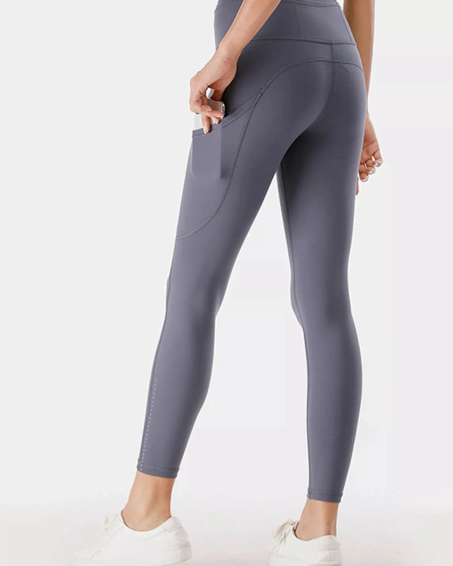 Full Size High - Waisted Active Leggings with Pockets Plus Size - Trendsi