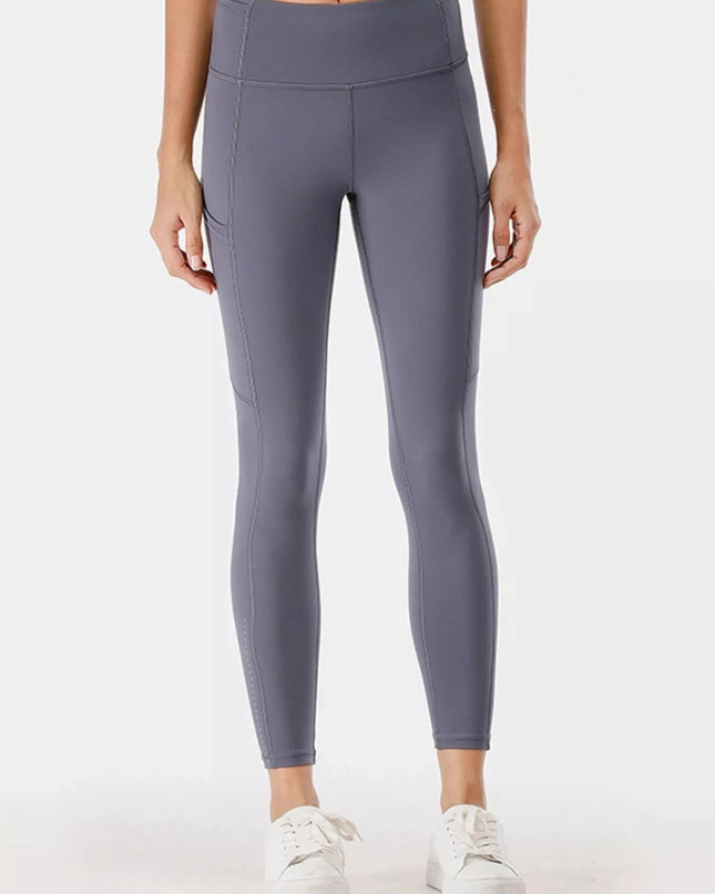 Full Size High - Waisted Active Leggings with Pockets Plus Size - Trendsi