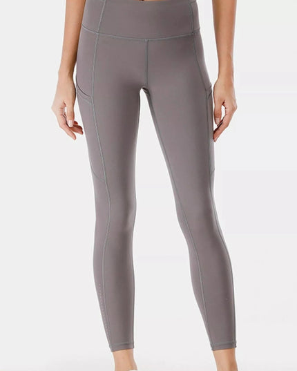 Full Size High - Waisted Active Leggings with Pockets Plus Size - Trendsi
