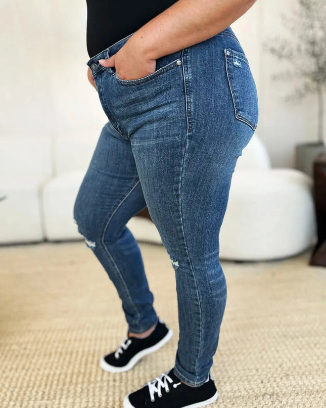 Judy Blue Full Size Mid Waist Distressed Slim Jeans - Trendsi