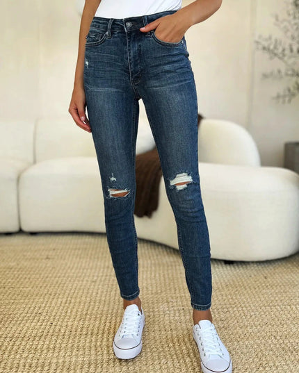 Judy Blue Full Size Mid Waist Distressed Slim Jeans - Trendsi