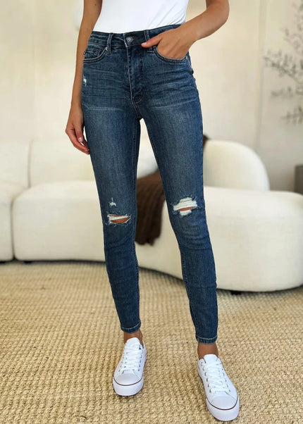 Judy Blue Full Size Mid Waist Distressed Slim Jeans - Trendsi