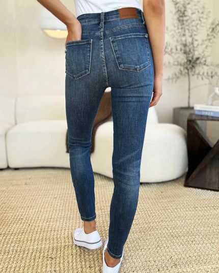 Judy Blue Full Size Mid Waist Distressed Slim Jeans - Trendsi